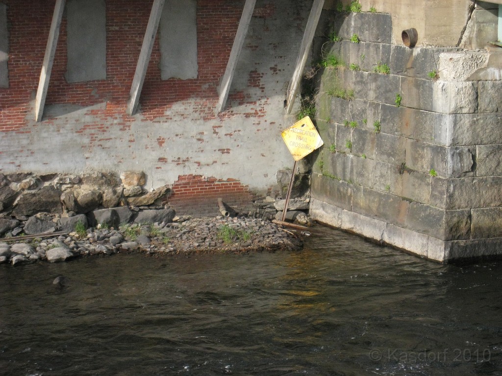 Tilton NH Rail Trail 2010 0075.jpg - Some sign at the bottom of the building, down on the river......